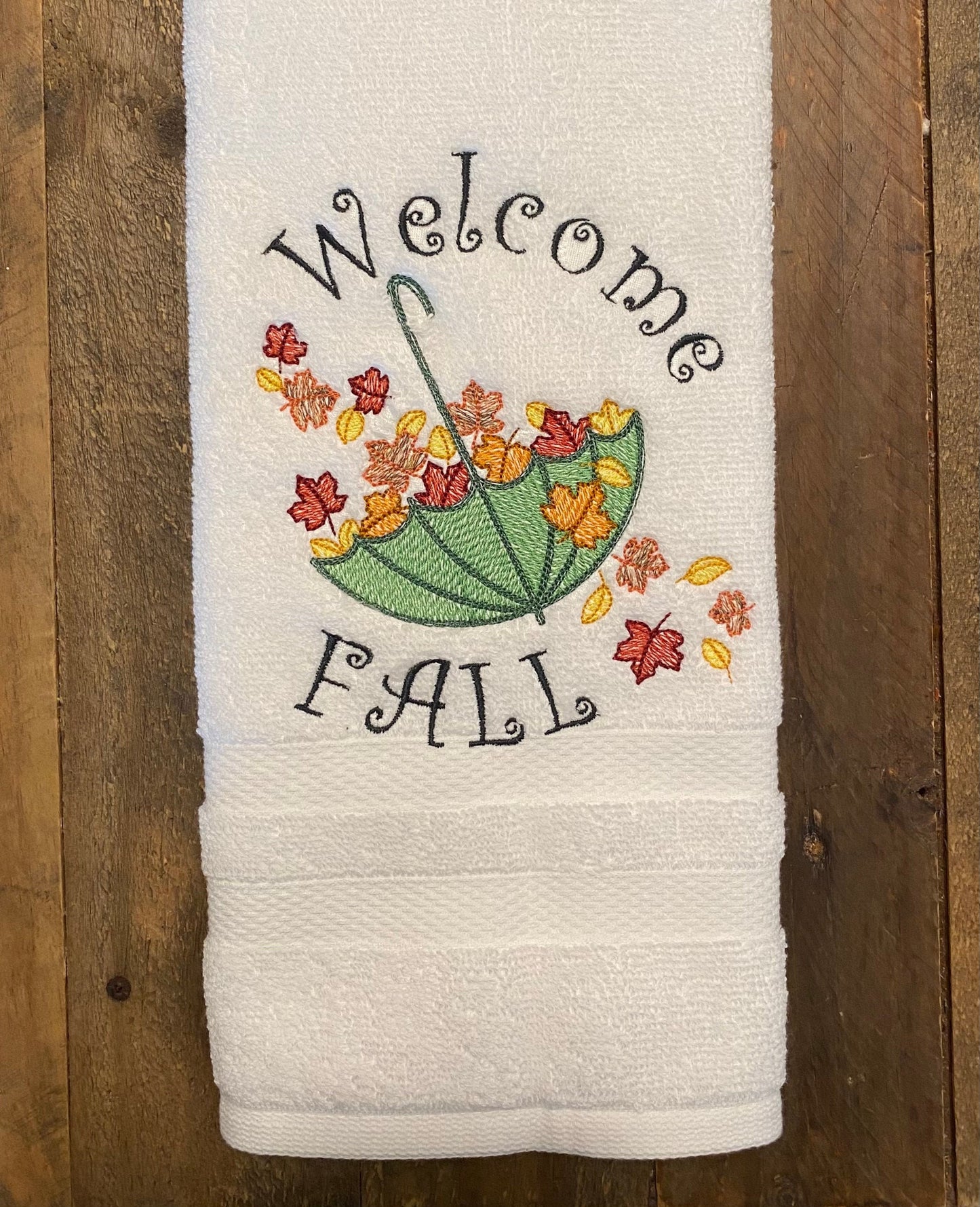 Fall Embroidered  White hand Towel. Autumn Parasol, Welcome Fall Umbrella with autumn leaves.